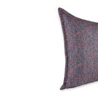 Cushion KULURI 50x50 in shades of purple with a colorful pattern and palette.